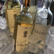 Wine bottles chilling on ice